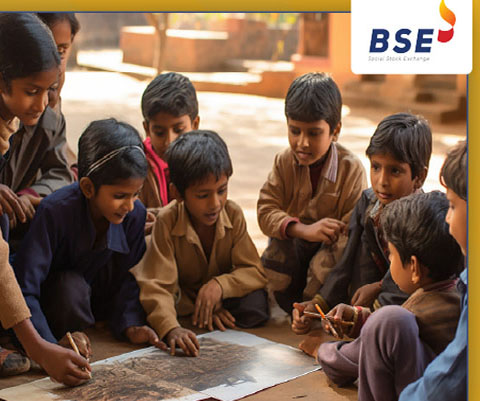 Group of children gathered around a table, engaged in a drawing activity.